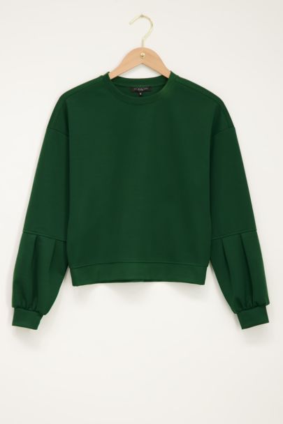 Groene sweater met ballonmouwen