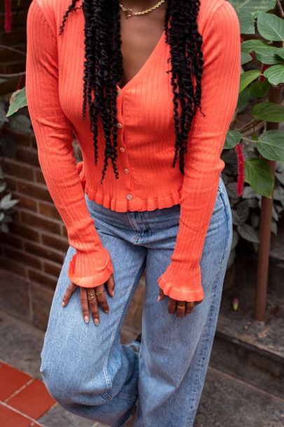 Coral V-neck cardigan with ruffles 