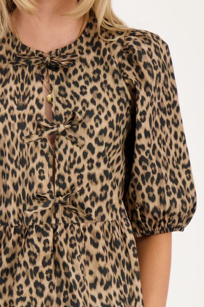 Leopard print top with bows and puff sleeves