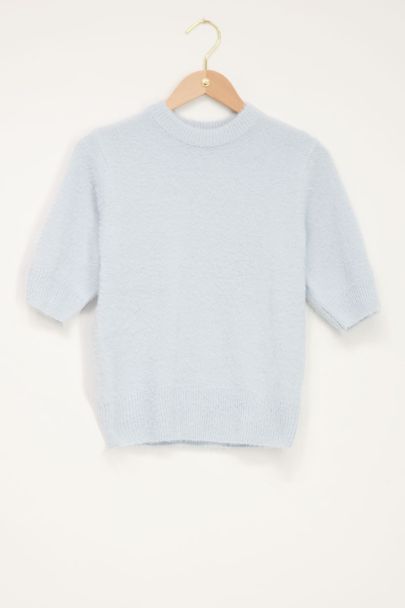 Light blue fluffy sweater with 3/4 length sleeves