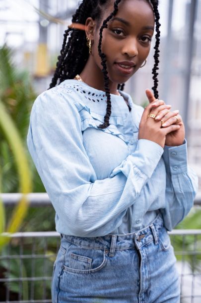 Light blue embroidered blouse with ruffle