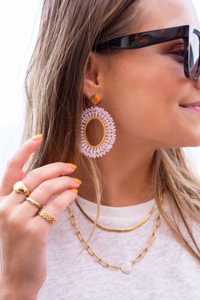 Light pink round statement earrings