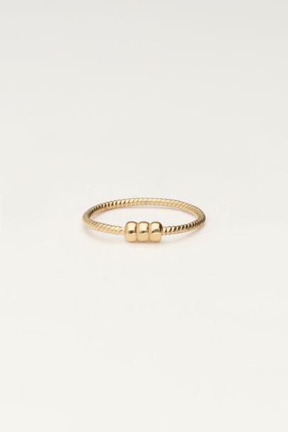 Minimalistische ring met structuur en drie bolletjes