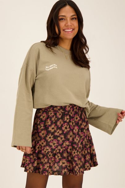 Taupe sweater with wave text