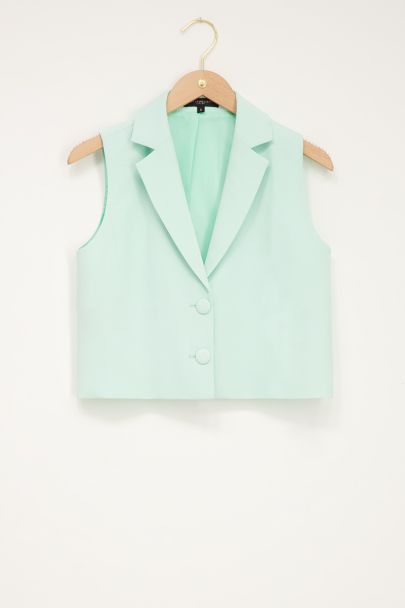 Mintgroene gilet met dubbele knoop