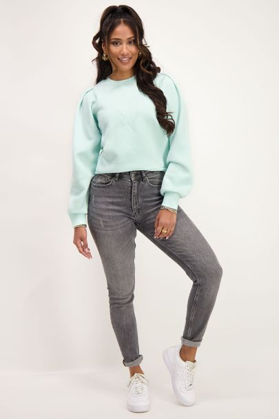 Mint green sweater with V shape