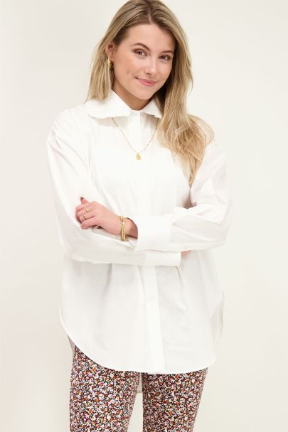 White blouse with ruffle collar