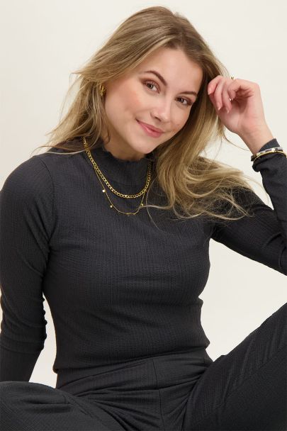 Grey top with turtleneck and structure
