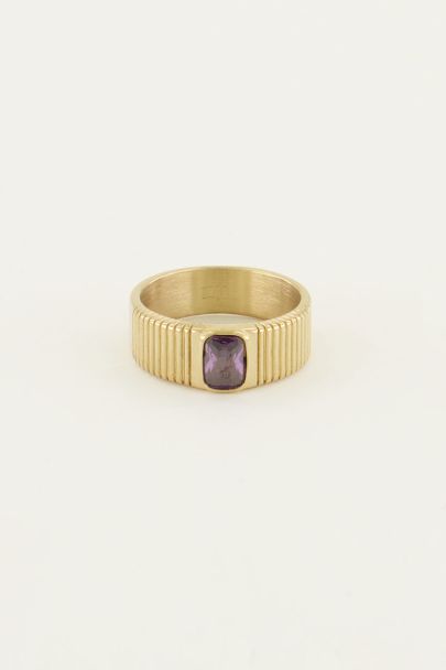 Wide ring with purple stone