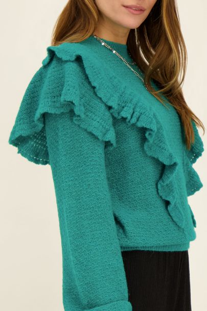 Turquoise sweater with ruffles
