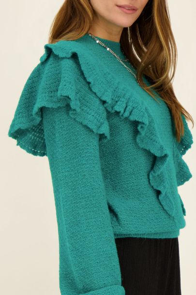 Turquoise trui met ruffles