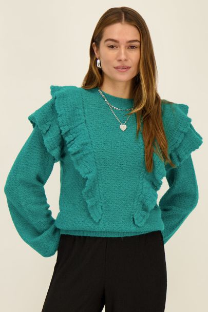 Türkiser Pullover mit Rüschen