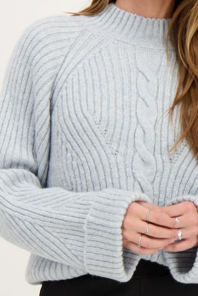 Light blue sweater with cropped sleeves
