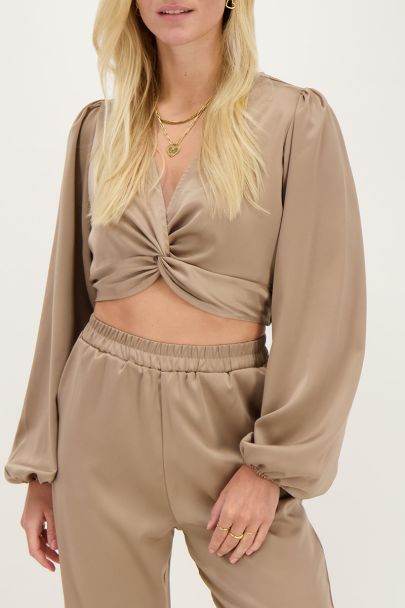 Beige satin top with knot