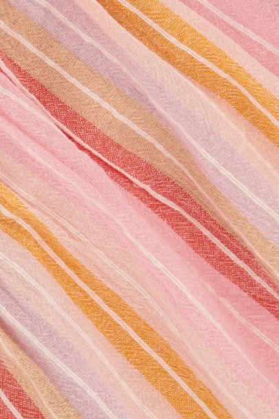 Robe multicolore rayée avec nœud et détails oranges