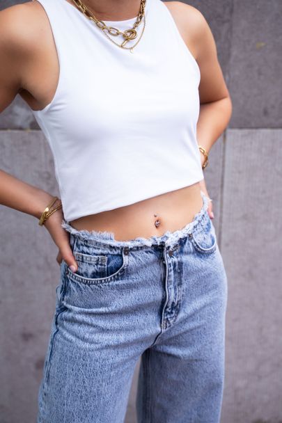 Heart charm navel piercing