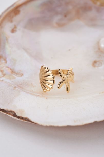 Ocean ring with seashell and starfish