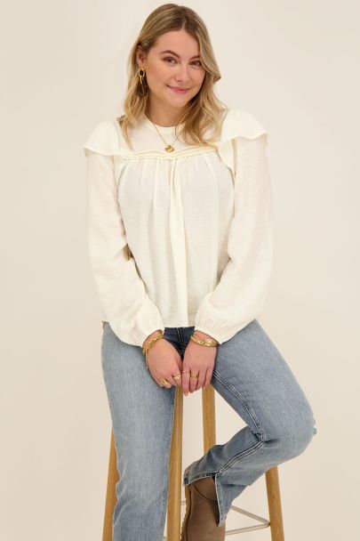 Off white blouse with ruffles