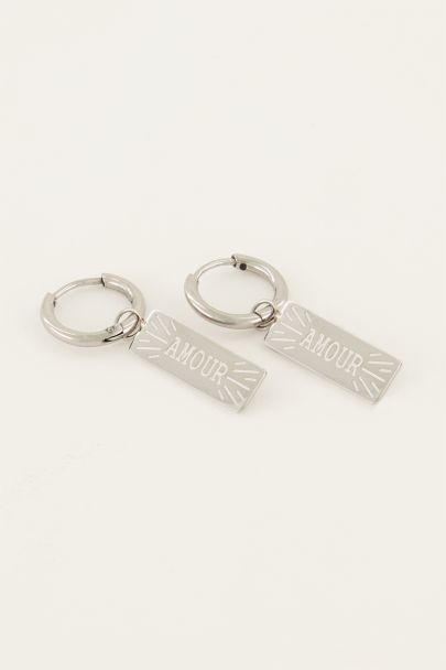 Earrings with amour charm