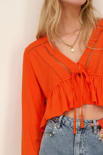 Orange top with lace straps & bow detail