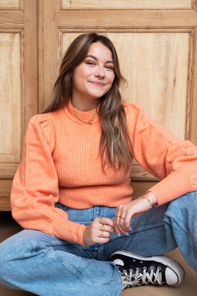 Orange rib turtleneck with puff sleeves