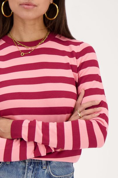 Pink and red striped top with long sleeves