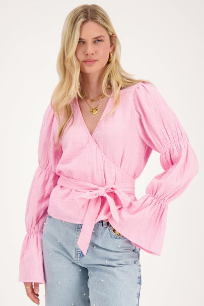 Roze blouse met wijde mouwen en strik