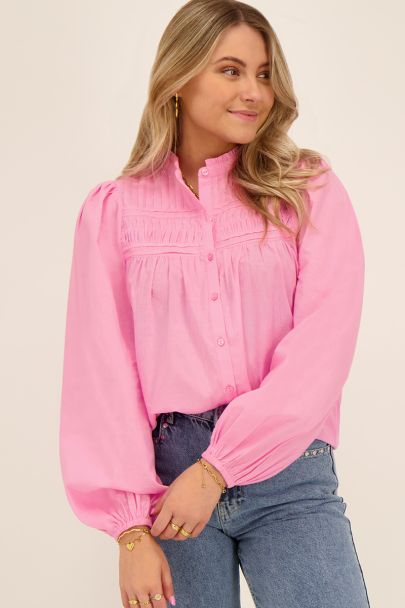 Roze blouse met plooien & pof mouwen