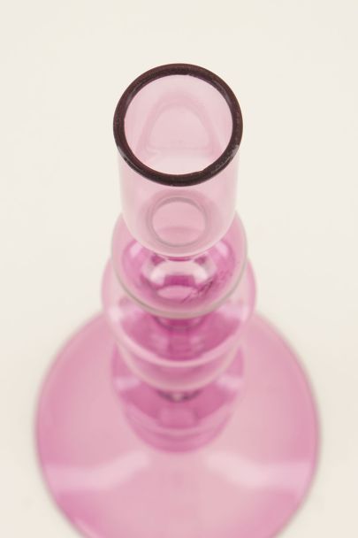 Pink glass candle holder with round details