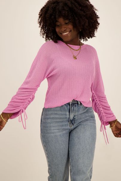 Roze top met structuur & trekkoordjes