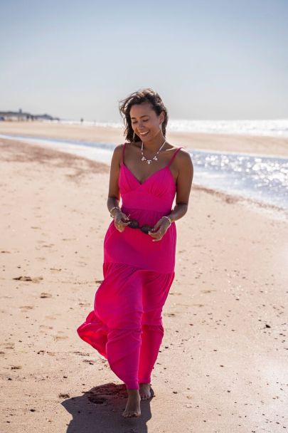 Robe longue fuschia avec nœud dans le dos