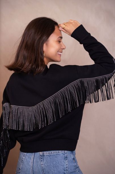 Zwarte sweater met studs & franjes