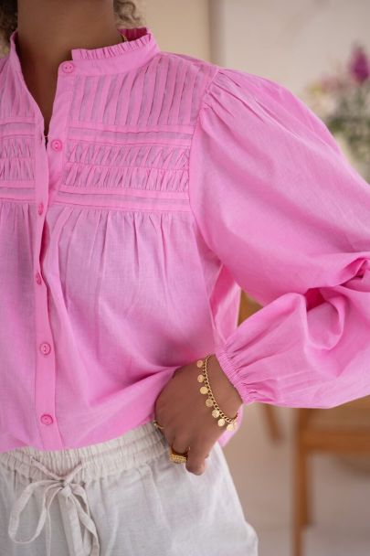 Roze blouse met plooien & pof mouwen