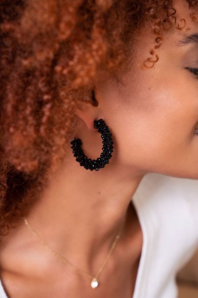 Black statement earrings