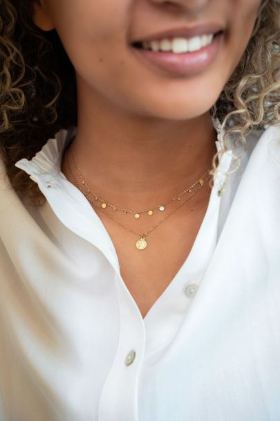 Collier avec petite pièce 