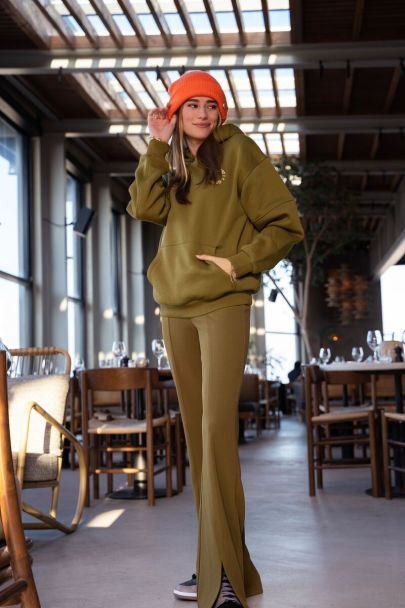 Green flared trousers with split