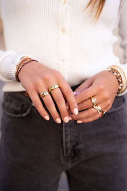 Iconic wide ring with ellipses