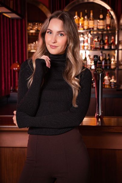 Zwarte rib coltrui met lurex