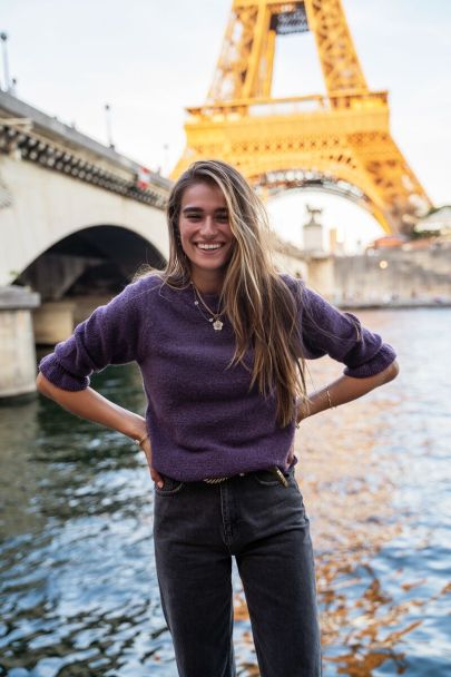 Purple knit sweater with ruffled sleeves