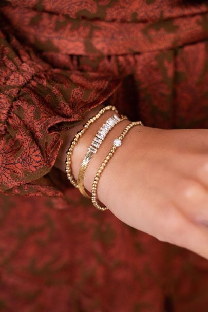 Elasticated bracelet with beads & cubes