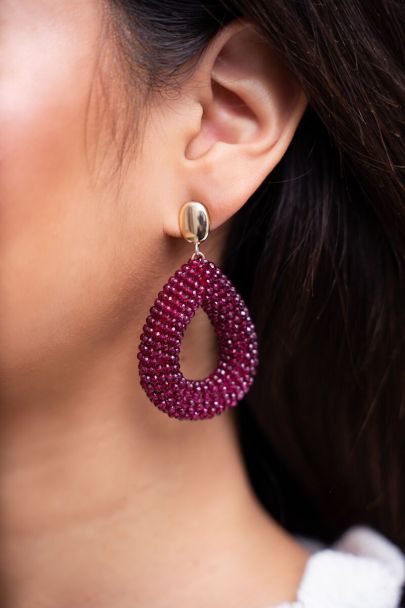 Statement earrings with purple drop