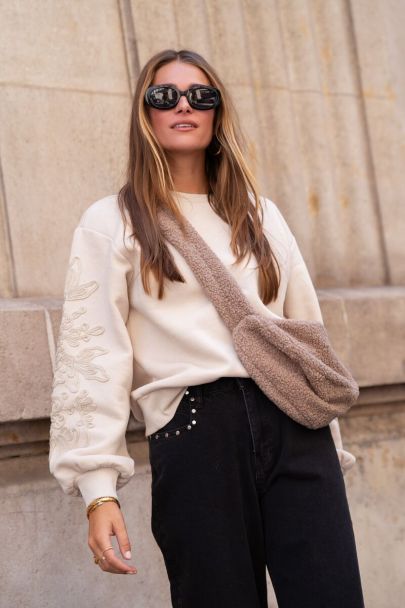 Beige sweater with embroidered sleeves