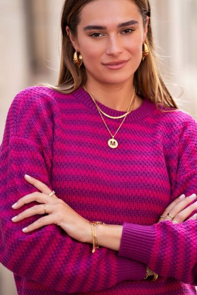 Purple jumper with structured stripes