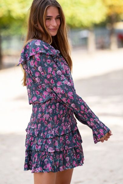 Dark green ruffled top with pink floral print