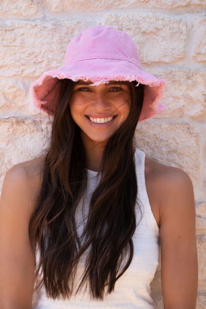 Pink bucket hat with frayed rim