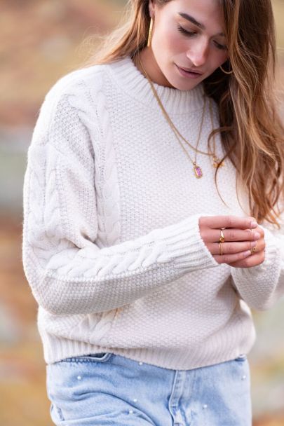 Pull beige en maille tressée