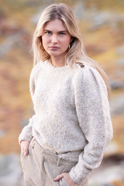 Beige sweater with shoulder buttons