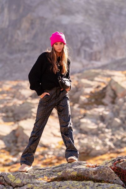 Black straight-leg trousers with studs