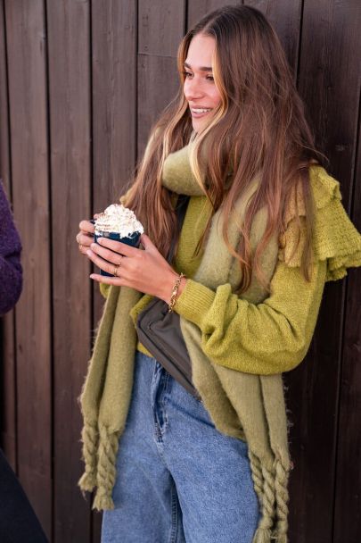 Green sweater with ruffles