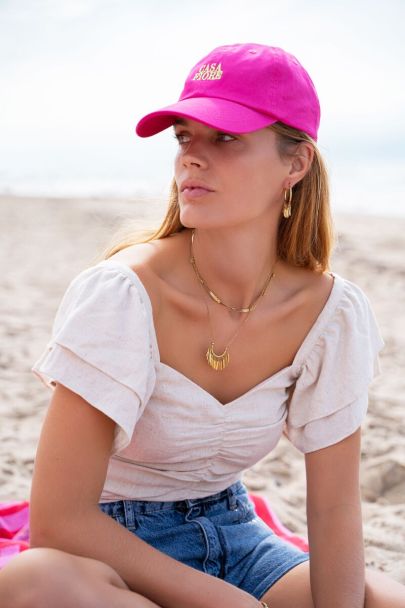 White short-sleeved top with ruffles